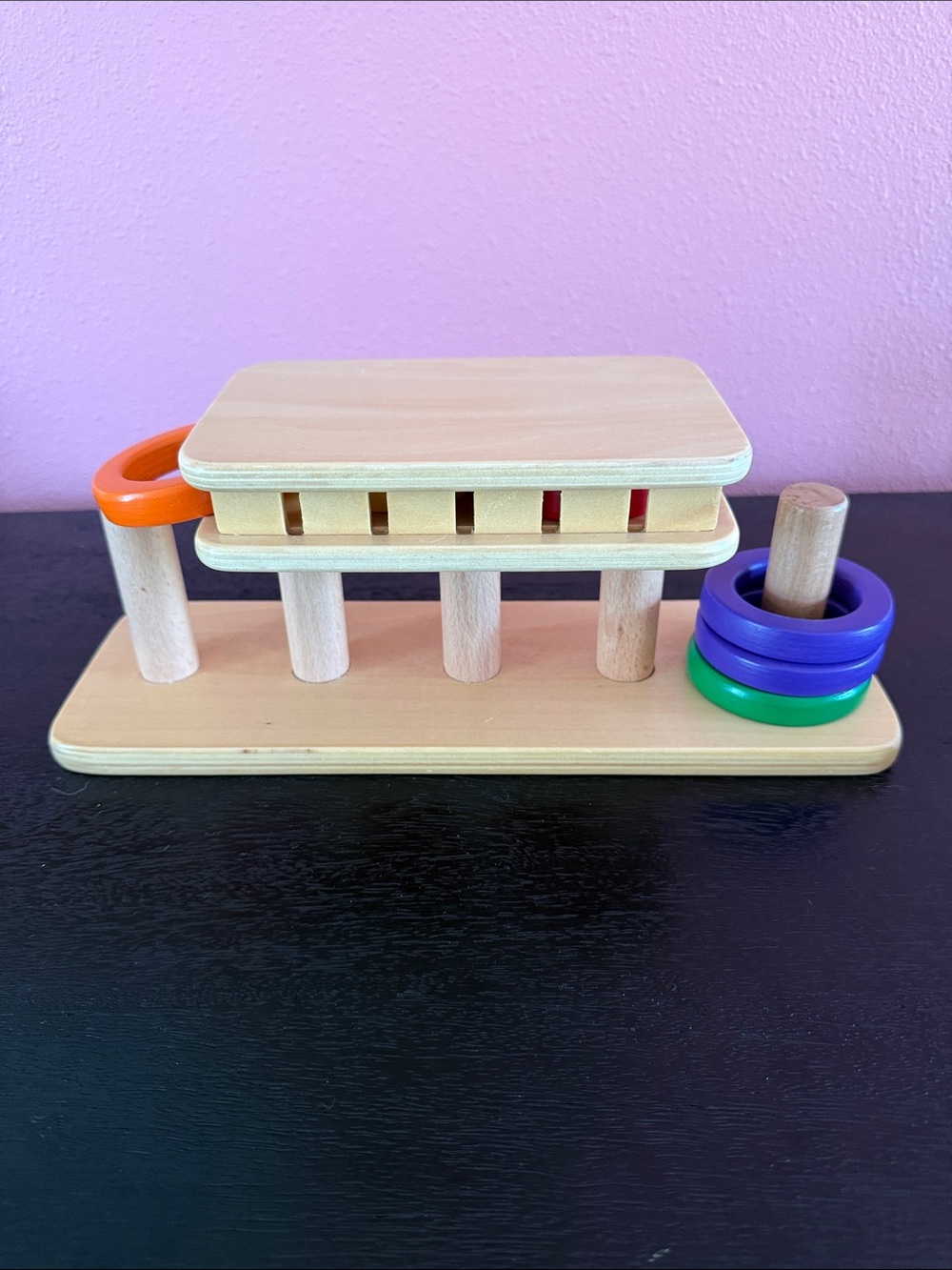 MontiKids Wooden Ring Slide Toy - Natural with Red, Orange, Yellow,Purple, Green